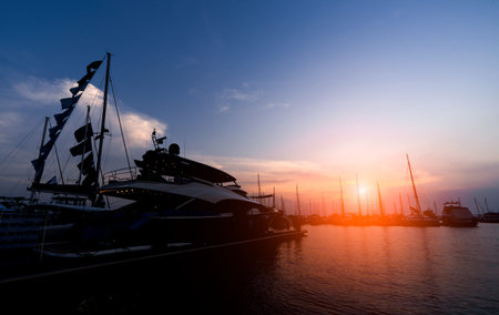 Beautiful view of marina and harbor with yachts and motorboats.
