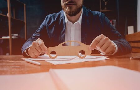 Man proposing signing a car insurance policy.の写真素材