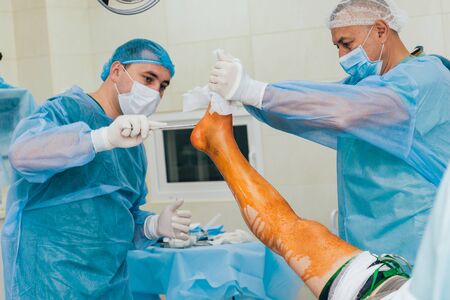 doctor and an assistant in the operating roomの写真素材