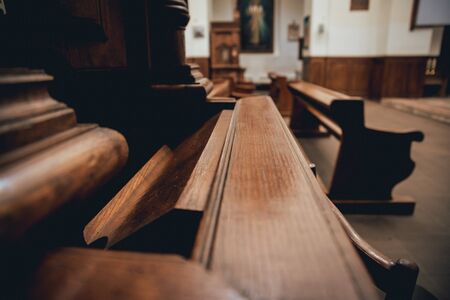 Wooden window of confessional box at churchの写真素材