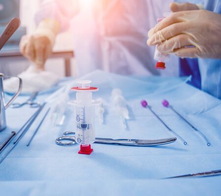 Platelet-Rich plasma preparation. Plasma in syringe. Centrifuge. Backgroundの写真素材