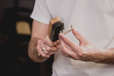 Young man with trendy haircut at barber shop.の写真素材
