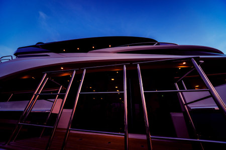 View of harbor with yachts details. Beautiful sunset sky in the marina bay.