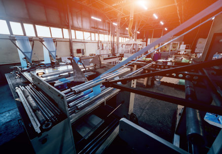 Modern automated production line in factory. Plastic bag manufacturing process. Background