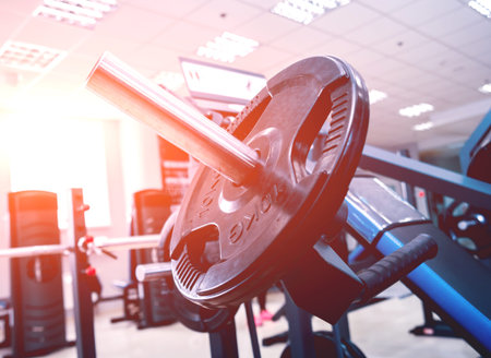 Diverse equipment at the gym room. Fitness club.