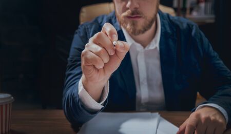 Man sign a home insurance policy on home loans. Estate agent with customerの写真素材