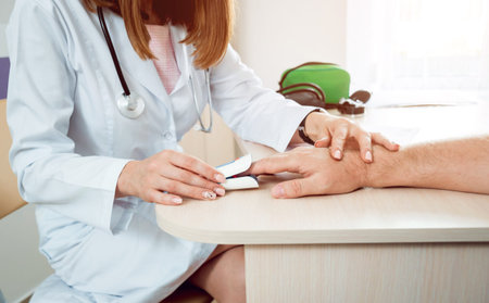 Doctor measuring man's heart rate. Diagnostic, healthcare.