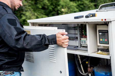 Ventilation cleaning. Specialist at work. Repair ventilation system. Industrial background
