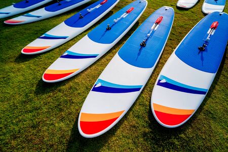A lot of surfboards on the beach. Summer background.の写真素材