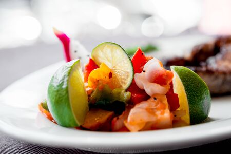 Vegetables on the white plate. Barbecue. Restaurant.の写真素材