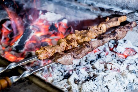 Delicious beef and pork barbecue on grill. Georgian restaurant. Backgroundの写真素材