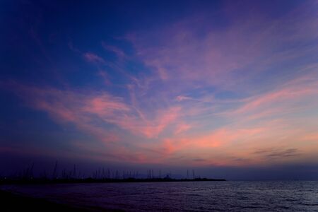 Beautiful tropical beach with palm trees. Sunrises and sunsets. Ocean.の写真素材