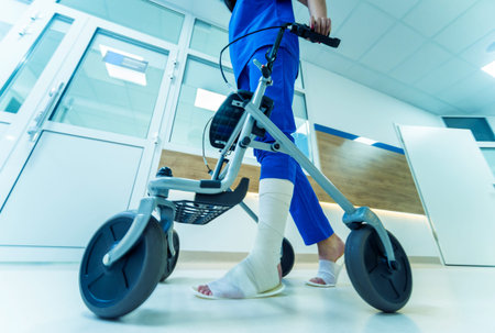 Patient on rollator with hand brakes moving in hospital. Medical concept