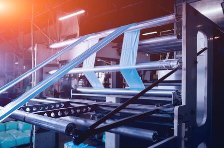 Modern automated production line in factory. Plastic bag manufacturing processの写真素材