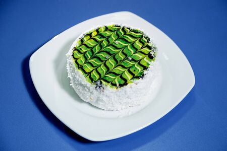 Cake on the blue table. Jelly in glass on the blue table.の写真素材