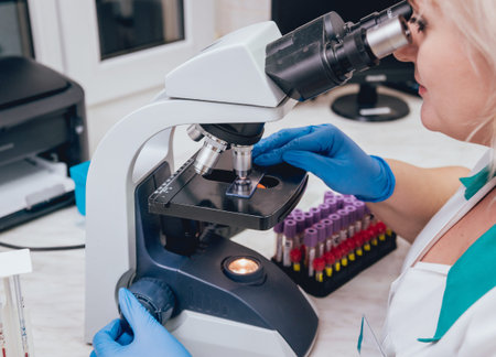 Laboratory assistant conducts a blood test. Medical equipment