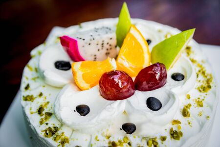 Cream cake with fruit and chocolate. Pastry Shopの写真素材