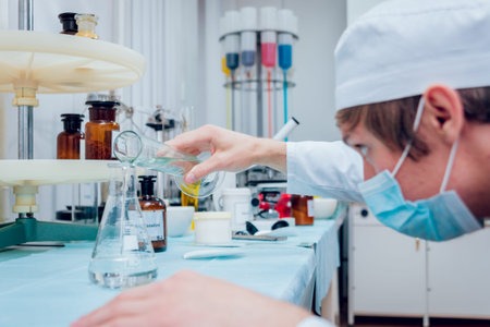 Science technician at work in the laboratory. Medical background