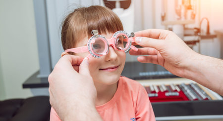 Trial frame. Glasses prescription for a child. Childs hypermetropy.