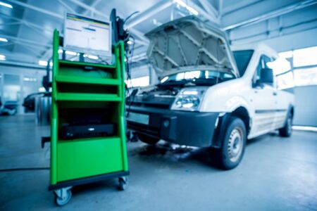 Computer diagnostics in the service station. Blurred background.の写真素材