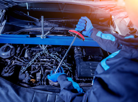 Repairing engine at service station. Car repair.