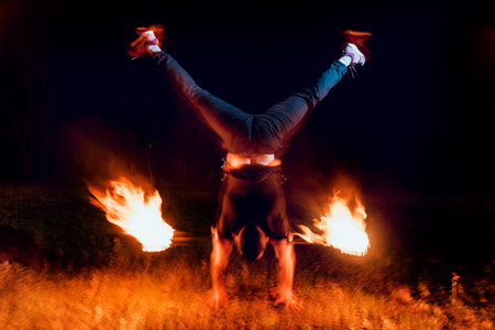 Fire show. Fire performance at the night. Background