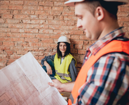 Happy couple making repairs to their home.