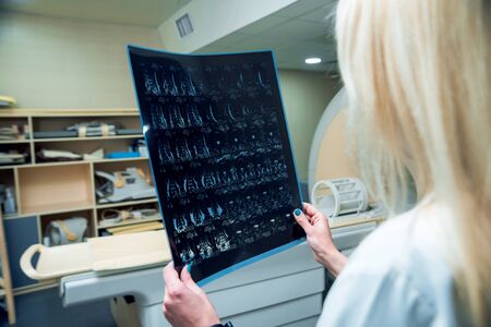Medical equipment. Doctor in MRI room at hospitalの写真素材