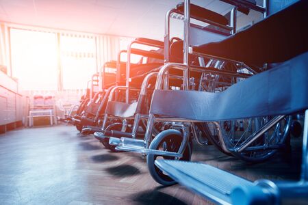 Empty wheelchairs at the hospital. Light Backgroundの写真素材