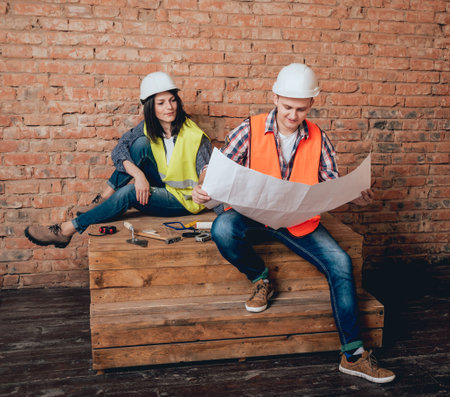 Happy couple making repairs to their home.
