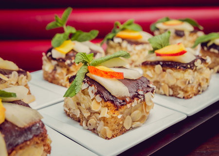 Dessert of biscuits and custard, decorated with fruit. The Restaurant