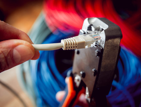Electrical equipment. Electricity cable and crimper. Background and texture