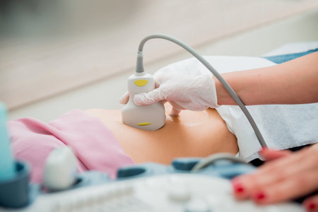 Ultrasound scanner in the hands of a doctor. Diagnostics. Sonography.
