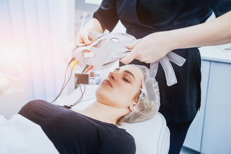 Young girl is relaxing in the spa. Physiotheraphy.
