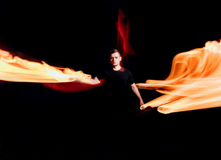 Fire show. Fire performance at the night.