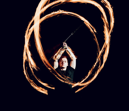 Fire show. Fire performance at the night.