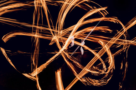 Fire show. Fire performance at the night.