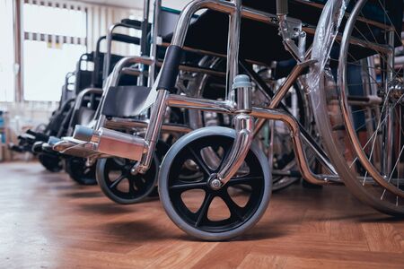 Empty wheelchairs at the hospital. Light Backgroundの写真素材