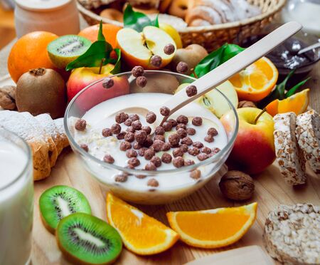 Beautiful breakfast. Milk fruits, bread and croissant. Backgroundの写真素材