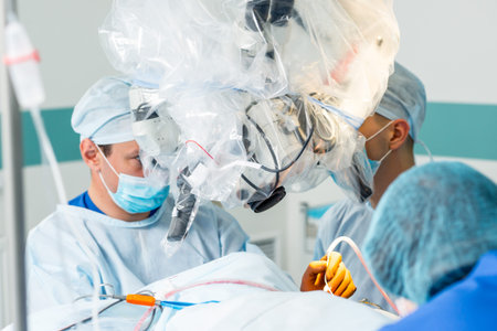 Brain surgery. Group of surgeons in operating room with surgery equipment. Modern medical background