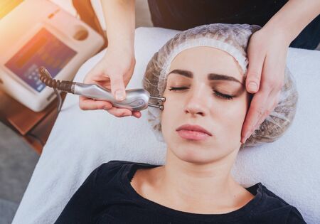 Young girl is relaxing in the spa.の写真素材