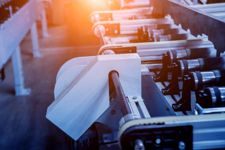 Production line of the wooden floor factory. CNC automatic woodworking machine.の写真素材