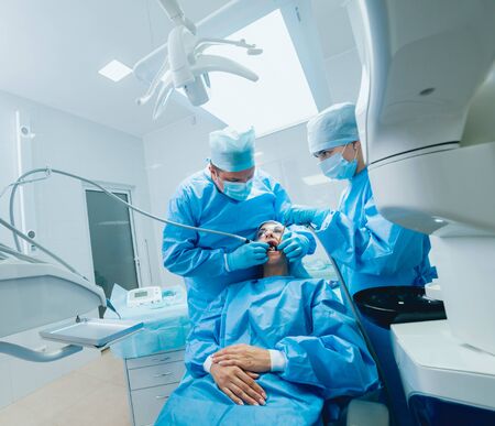 Treatment of tooth loss. Modern dental technologies. Backgroundの写真素材