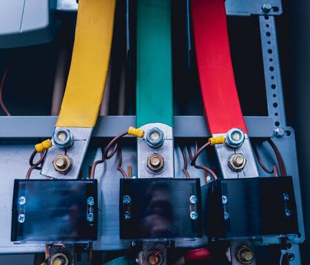 Wires and switches in electric box. Electrical panel with fuses and contactors. Background and textureの写真素材