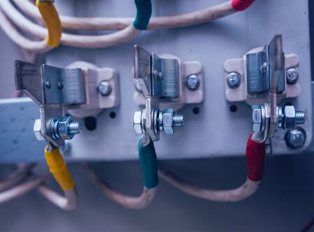 Wires and switches in electric box. Electrical panel with fuses and contactors. Background and textureの写真素材