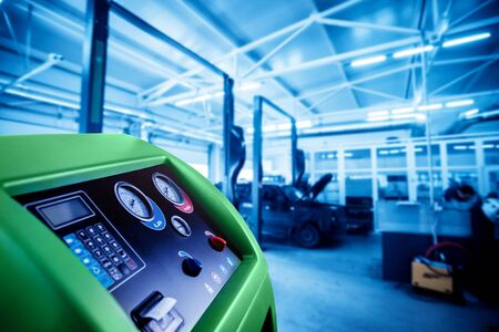 Servicing car air conditioner. Service station. Car repair.の写真素材