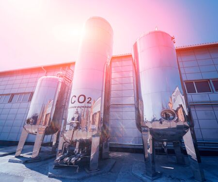 The tank with water, carbon and ladder. Equipment for beverages factory. Backgroundの写真素材