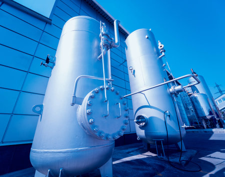 The tank with water, carbon and ladder. Equipment for beverages factory. Background