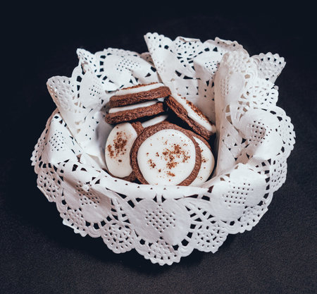 French cookies with chokolate on the white plate.
