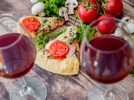Large pizza on a wooden table. Restaurant.の写真素材